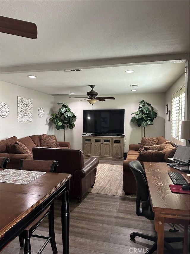 living area featuring ceiling fan, recessed lighting, wood finished floors, and visible vents