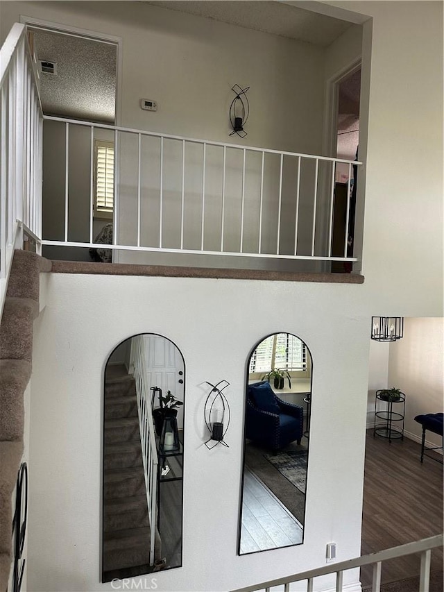 interior space featuring visible vents and wood finished floors