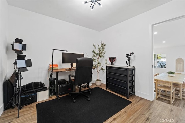 office area with baseboards, recessed lighting, and wood finished floors
