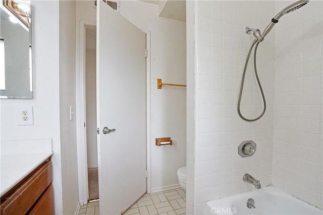 full bath with toilet, visible vents, bathing tub / shower combination, and vanity
