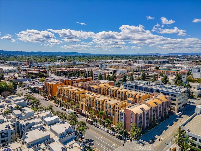 birds eye view of property with a view of city