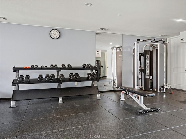 exercise room featuring recessed lighting and visible vents