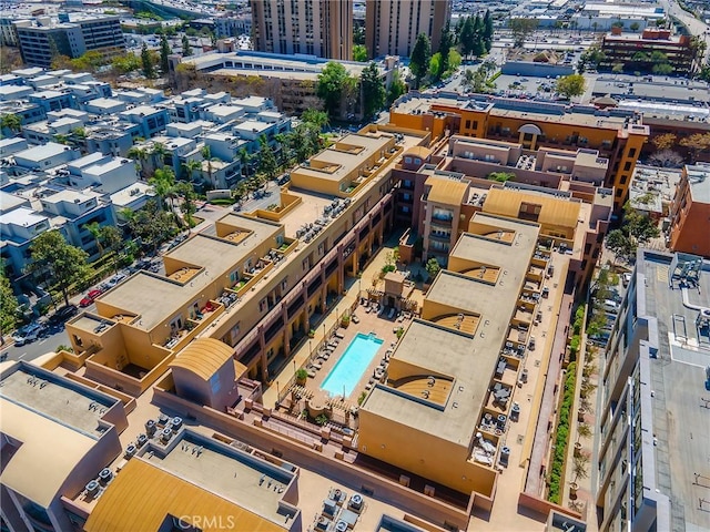birds eye view of property with a city view
