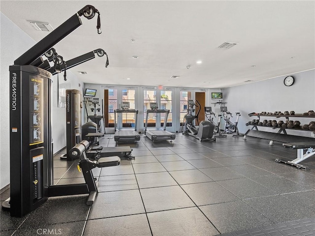 exercise room featuring recessed lighting and visible vents