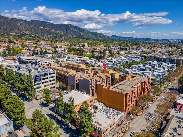 drone / aerial view featuring a mountain view