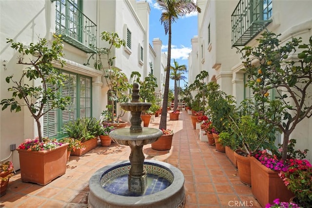 view of property's community featuring a patio