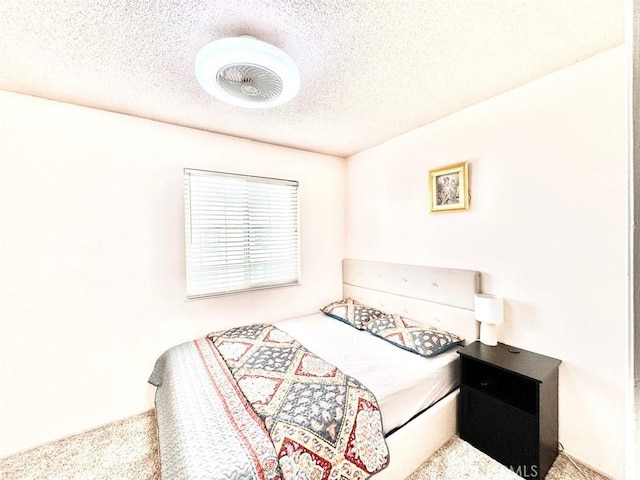bedroom with a textured ceiling