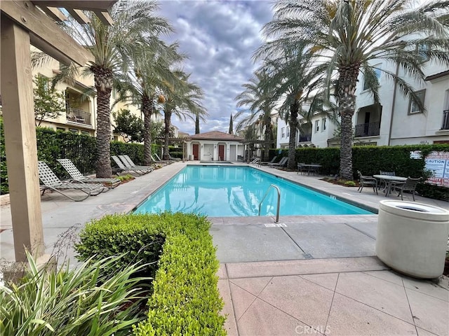 pool with a patio