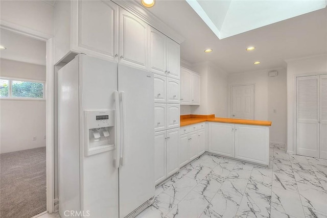 3442 Delta Ave, Rosemead, CA 91770 - kitchen featuring white refrigerator with ice dispenser, recessed lighting, a peninsula, white cabinetry, and light marble finish flooring