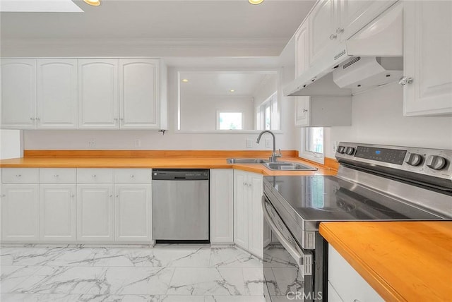 3442 Delta Ave, Rosemead, CA 91770 - kitchen with appliances with stainless steel finishes, under cabinet range hood, light marble finish flooring, white cabinets, and ornamental molding