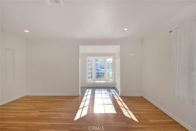 3442 Delta Ave, Rosemead, CA 91770 - spare room with wood finished floors, ornamental molding, and recessed lighting