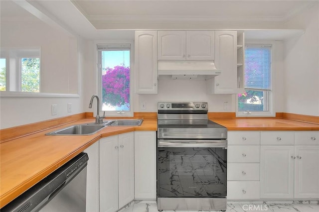 3442 Delta Ave, Rosemead, CA 91770 - kitchen with appliances with stainless steel finishes, under cabinet range hood, white cabinetry, healthy amount of natural light, and crown molding