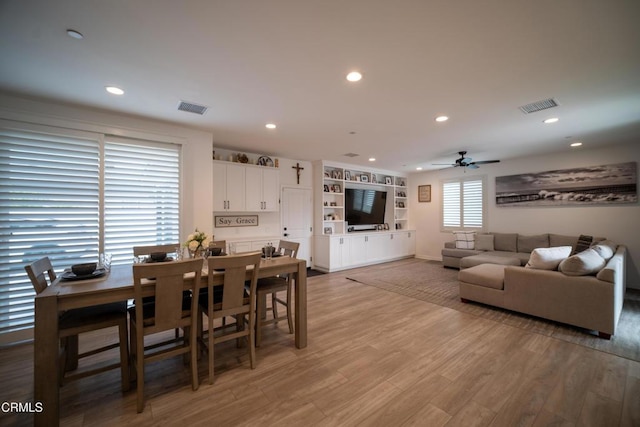 living room with recessed lighting, ceiling fan, and visible vents