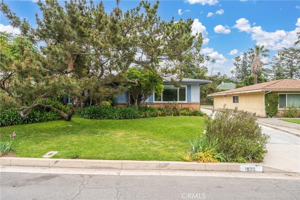 1920 Maiden Ln, Altadena, CA 91001 - view of front facade with brick siding and a front yard