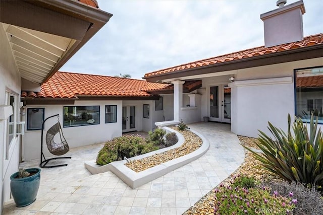 exterior space featuring french doors