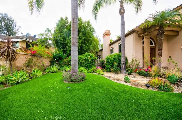 view of yard featuring fence