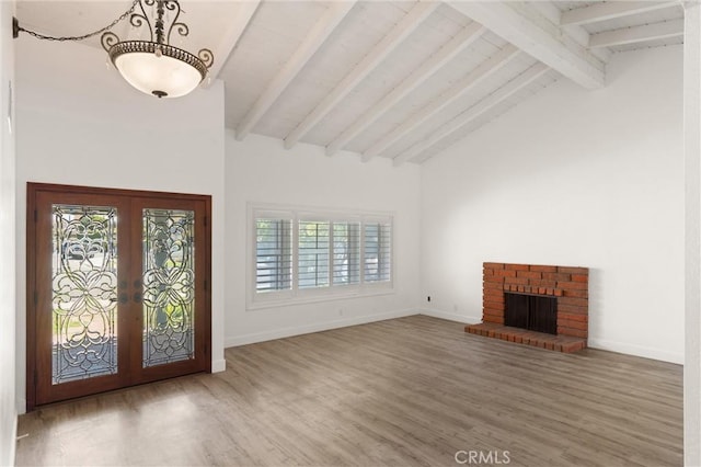 22122 Cape May Ln, Huntington Beach, CA 92646 - foyer entrance with french doors, beam ceiling, baseboards, and wood finished floors