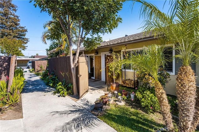 134 S Magnolia Ave Unit 21A, Anaheim, CA 92804 - view of front of house with fence and stucco siding