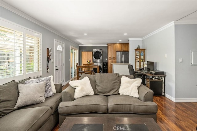 134 S Magnolia Ave Unit 21A, Anaheim, CA 92804 - living area featuring ornamental molding, baseboards, stacked washing maching and dryer, dark wood-style floors, and recessed lighting