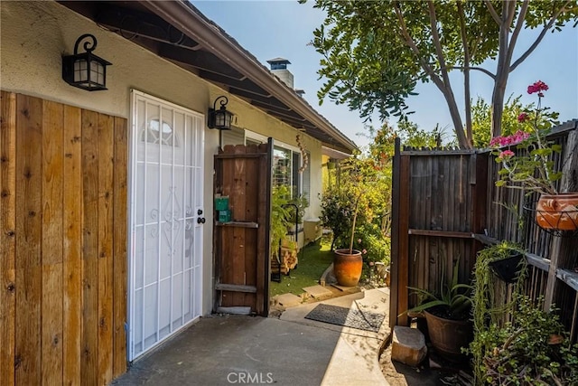 134 S Magnolia Ave Unit 21A, Anaheim, CA 92804 - entrance to property with fence and a chimney