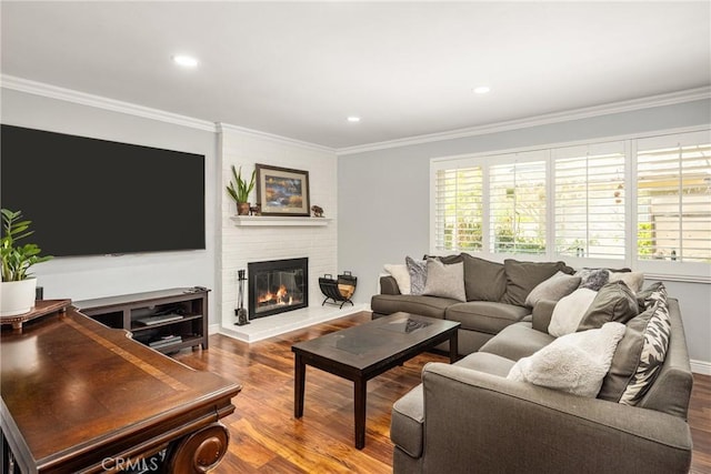134 S Magnolia Ave Unit 21A, Anaheim, CA 92804 - living area featuring crown molding, a fireplace, recessed lighting, and wood finished floors