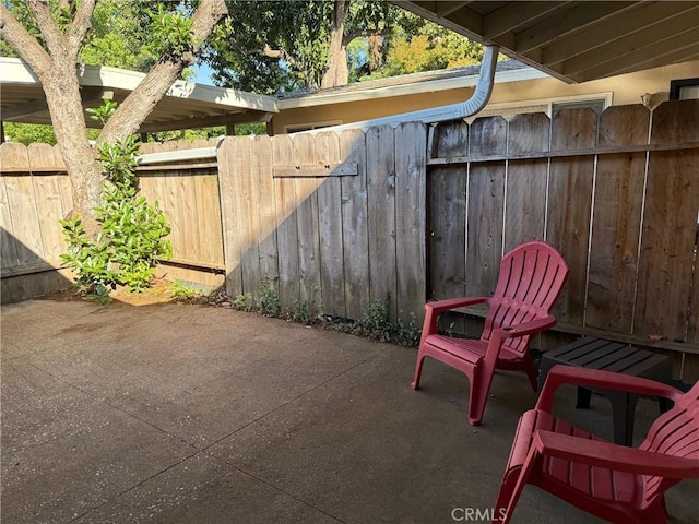view of patio with fence