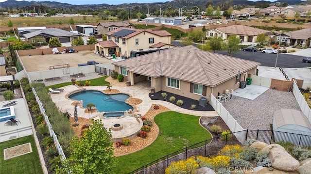 bird's eye view featuring a residential view and a mountain view