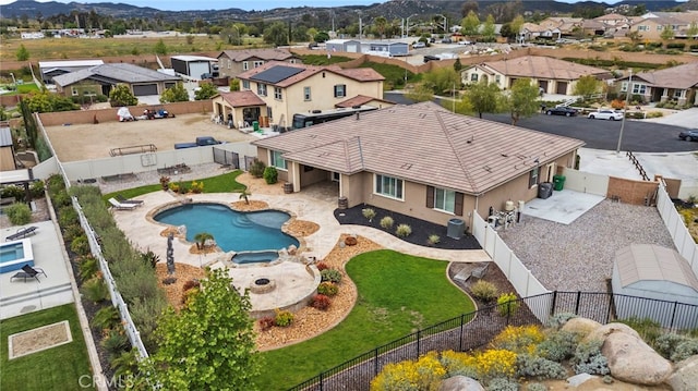 30404 Canyon Point Cir, Menifee, CA 92584 - aerial perspective of suburban area with a mountainous background and a pool area