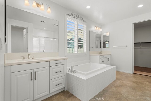 30404 Canyon Point Cir, Menifee, CA 92584 - full bathroom featuring vanity, a bath, and a stall shower