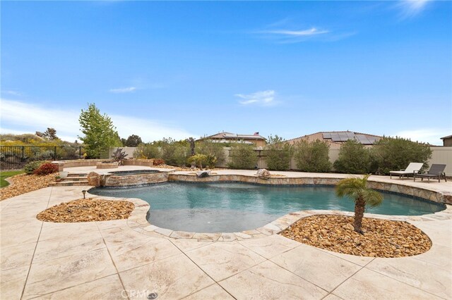 30404 Canyon Point Cir, Menifee, CA 92584 - view of pool featuring a fenced backyard, a patio, and a pool with connected hot tub