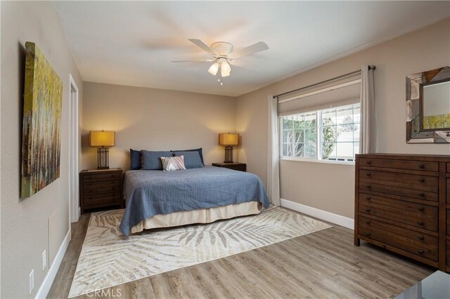 26872 Vista Del Mar, Dana Point, CA 92624 - bedroom featuring baseboards, ceiling fan, and wood finished floors