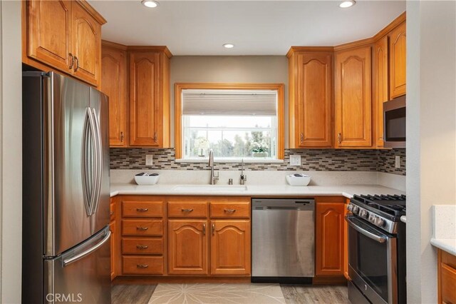 26872 Vista Del Mar, Dana Point, CA 92624 - kitchen featuring a sink, brown cabinets, and stainless steel appliances
