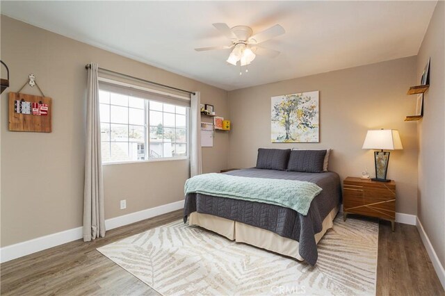 26872 Vista Del Mar, Dana Point, CA 92624 - bedroom featuring baseboards, a ceiling fan, and wood finished floors