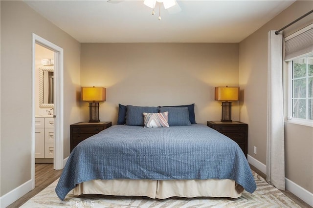 26872 Vista Del Mar, Dana Point, CA 92624 - bedroom with a ceiling fan, wood finished floors, a sink, baseboards, and connected bathroom