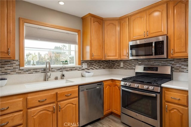 26872 Vista Del Mar, Dana Point, CA 92624 - kitchen featuring light countertops, a sink, tasteful backsplash, and stainless steel appliances