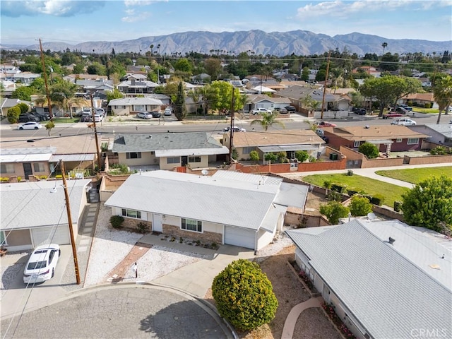 bird's eye view with a residential view and a mountain view