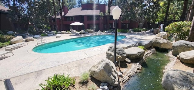 pool featuring a patio