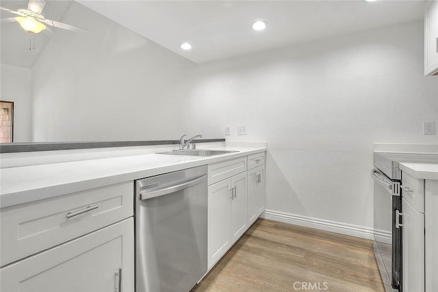 348 S Prospectors Rd Unit 8, Diamond Bar, CA 91765 - kitchen with stainless steel appliances, a sink, a ceiling fan, light countertops, and light wood-type flooring