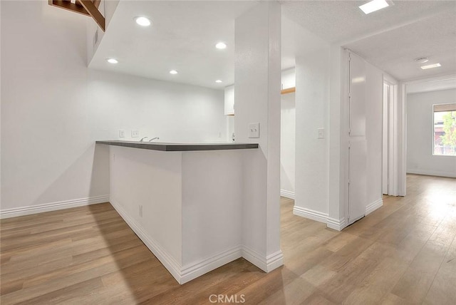 348 S Prospectors Rd Unit 8, Diamond Bar, CA 91765 - kitchen featuring wood finished floors, baseboards, and recessed lighting