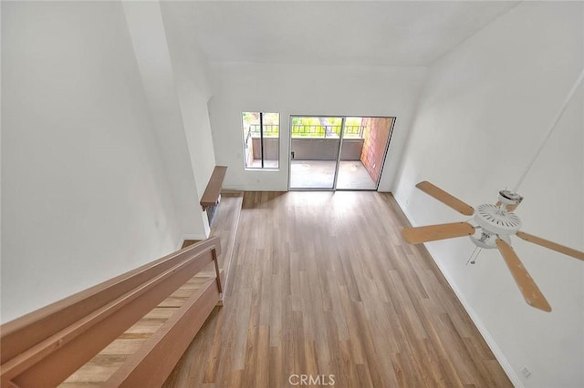 348 S Prospectors Rd Unit 8, Diamond Bar, CA 91765 - unfurnished living room featuring light wood-style flooring, ceiling fan, and baseboards