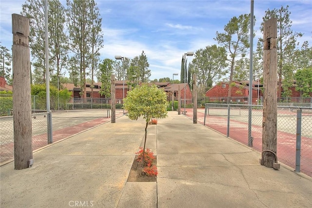 348 S Prospectors Rd Unit 8, Diamond Bar, CA 91765 - surrounding community featuring a tennis court and fence