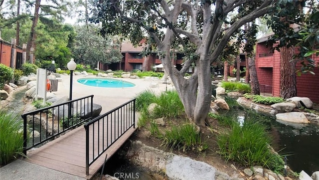 348 S Prospectors Rd Unit 8, Diamond Bar, CA 91765 - swimming pool featuring a patio area