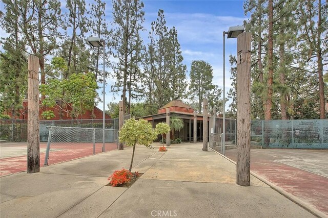 348 S Prospectors Rd Unit 8, Diamond Bar, CA 91765 - surrounding community with fence and a tennis court
