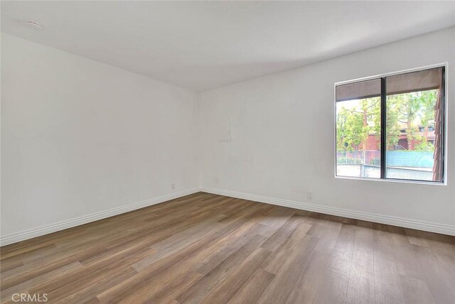 348 S Prospectors Rd Unit 8, Diamond Bar, CA 91765 - unfurnished room featuring wood finished floors and baseboards
