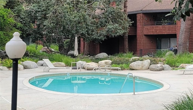 348 S Prospectors Rd Unit 8, Diamond Bar, CA 91765 - view of swimming pool with a patio and fence