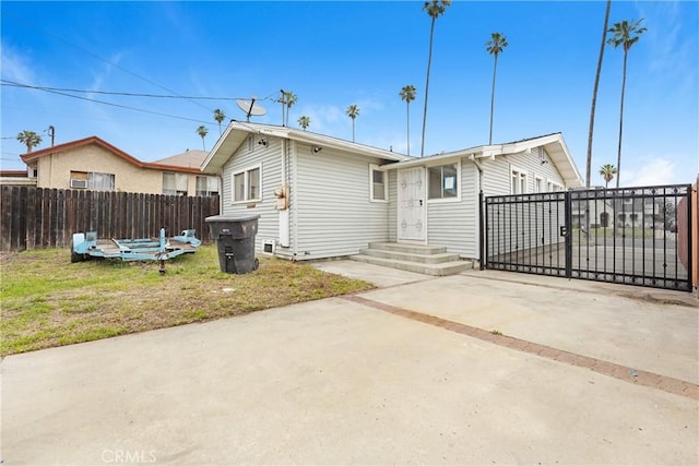 back of property with fence