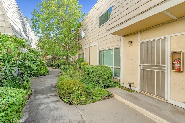 view of home's exterior with stucco siding