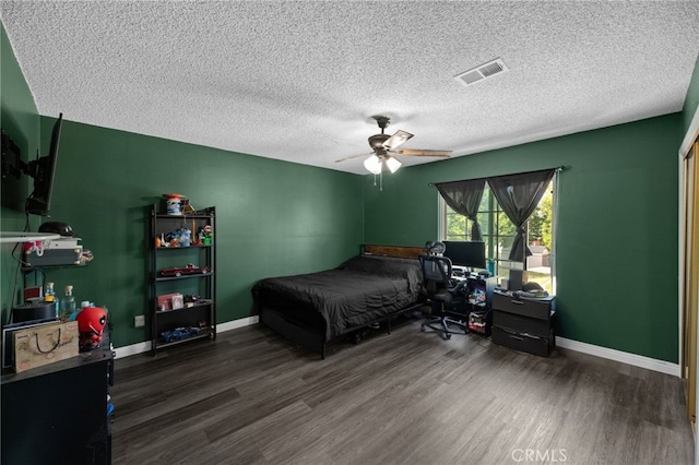 15064 Marcolesco St, Lake Elsinore, CA 92530 - bedroom featuring a ceiling fan, a textured ceiling, visible vents, wood finished floors, and baseboards