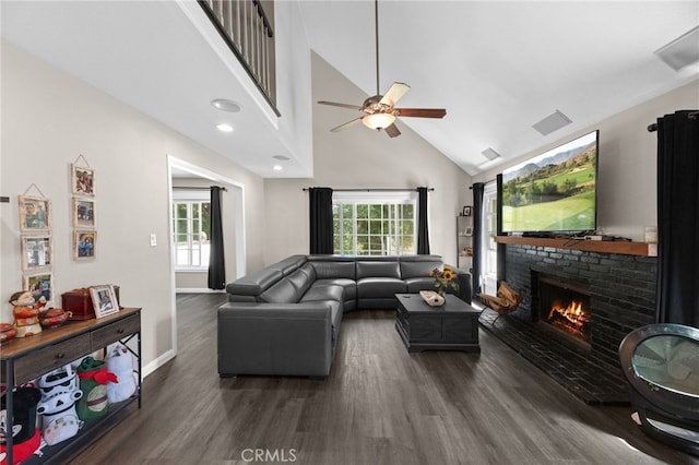 15064 Marcolesco St, Lake Elsinore, CA 92530 - living room featuring plenty of natural light, a brick fireplace, wood finished floors, and high vaulted ceiling