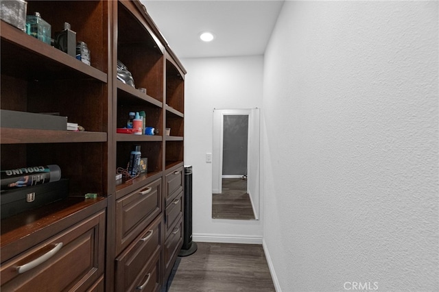 15064 Marcolesco St, Lake Elsinore, CA 92530 - walk in closet with dark wood-type flooring